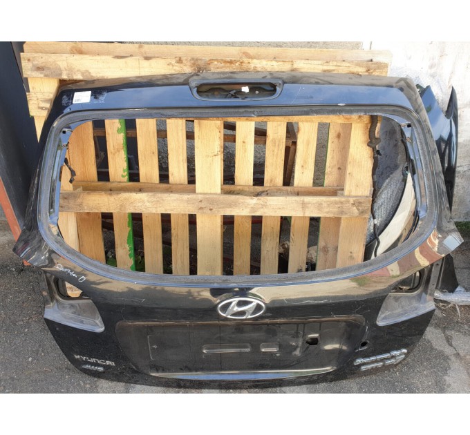 кришка багажника ляда не під спойлер Hyundai Santa Fe (2006-2012) 737002B071