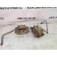 скоба суппорта переднего NISSAN X-TRAIL T30 (2002-2008) 411338H300